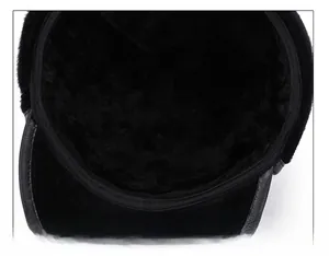 Detailed close-up of winter hat interior featuring plush faux fur and reinforced stitching