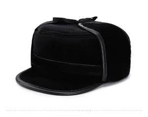 Detailed side view of black faux mink fur winter trapper hat with leather piping trim