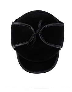 Top view of a black faux mink winter hat for men showing the bow detail and warm earflaps