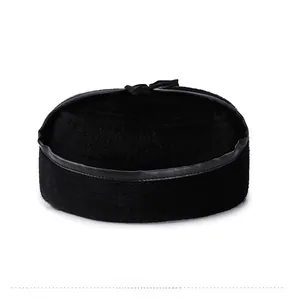 Rear view of winter faux fur hat for men featuring a black decorative ribbon bow detail