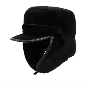 Detail view of winter faux fur earflap hat for men with premium leather brim trim