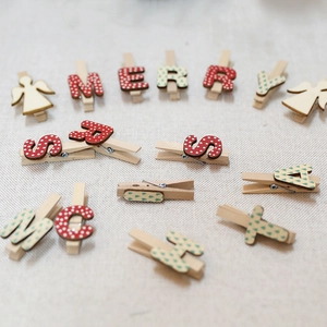 Christmas Merry Christmas wooden clips set with festive alphabet letters on burlap texture