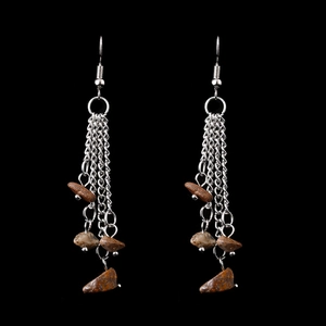 Detailed view of handmade bohemian tassel earrings with natural brown crystal stone beads
