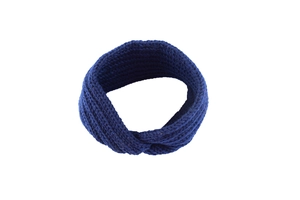 Detail of dark blue chunky knit headband with twisted cross design for winter warmth