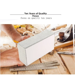 Detailed view of rectangular jewelry polishing block with grey fine-grain texture