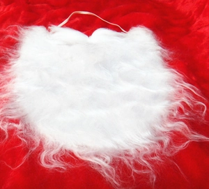 Macro detail of plush white Santa beard fibers with elastic strap on red background