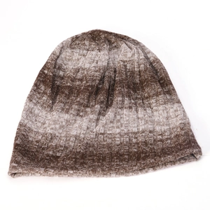Detail showing the brown gradient knit texture and slouchy design of the warm beanie