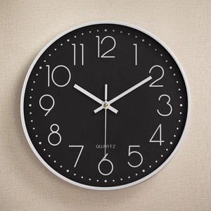 14-inch minimalist silent wall clock with black dial and 3D white numerals for living room