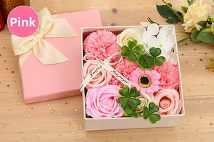 Detailed view of pink soap flower gift box with carnations, roses and silk ribbon