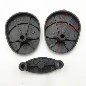 Close-up of black plastic telescopic leg bases with model 8801 for Christmas dolls