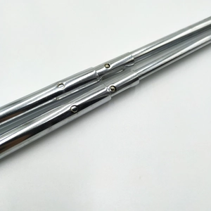 Macro shot of adjustable metal telescopic poles with locking pins for Christmas dolls