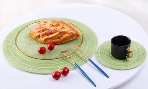 Detail of light green ramie placemat and coaster set with spiral woven texture