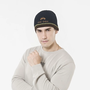 Men's black knitted beanie with cool cheer embroidery and striped brim on white background