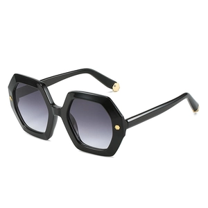 Chic black hexagonal sunglasses with gradient grey lenses and golden rivet accents
