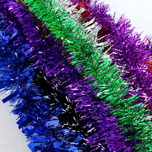 Colorful metallic tinsel garlands for Christmas tree decoration and festive party supplies