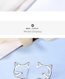 Detailed view of hollow minimalist cat ear studs in high-quality polished S925 sterling silver