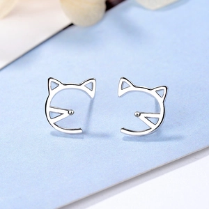 Cute hollow cat ear studs in silver minimalist style for women with creative cat design