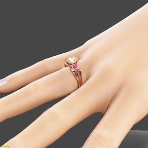 Rose gold ring with round center stone, pink heart side stones, and vintage engravings