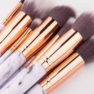 10-piece marble texture makeup brush set with rose gold ferrules and soft synthetic bristles