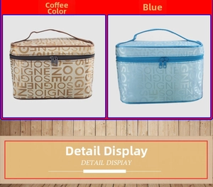 Close-up detail of large capacity travel cosmetic bags with SOIGNEZ print and sturdy handle