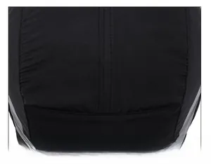 Close-up of double-stitched top seam on a black winter baseball cap with gray accents