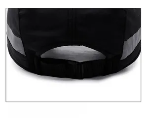 Detail of adjustable back strap and gray reflective stripes on black baseball cap