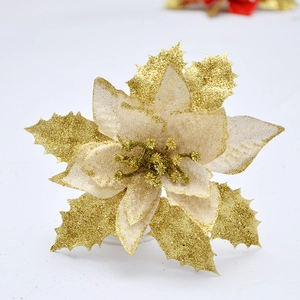 Golden artificial poinsettia flower for Christmas tree and wreath decoration with glitter