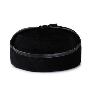 Winter men's faux fur cap in black plush with warm ear protection and bow detail