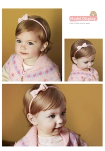 Detail of pink bow baby headband featuring elastic ribbed fabric for infant hair accessories
