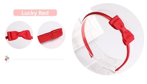 Detail view of lucky red bow headband with ribbed ribbon texture and fabric wrap