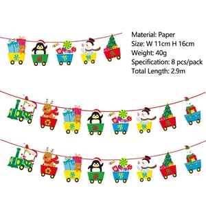 Detail of paper Christmas train banner with Santa and reindeer motifs for party decor