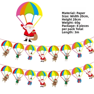 Detailed view of 3m Christmas paper bunting featuring Santa and reindeer on parachutes