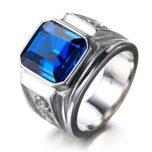 Detailed close-up of blue square gemstone set in embossed silver-tone ring for men