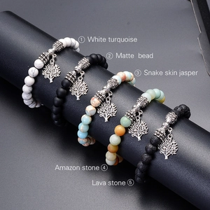 Lava stone and amazonite yoga bracelets featuring a metal Tree of Life charm pendant