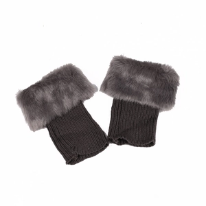 Dark brown faux fur trimmed knitted leg warmers for boots shown in a flat lay view