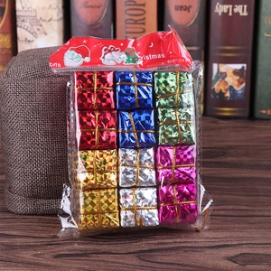 Close-up of 12-piece colorful laser gift box ornaments for Christmas tree decoration