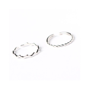 Minimalist S925 sterling silver wavy and twisted open rings set on a white background