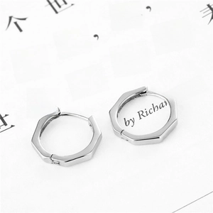 Minimalist silver hexagonal earrings with polished finish and snap closure design