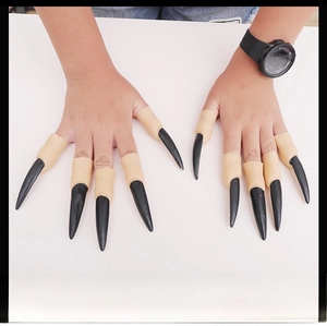 Detailed view of ten black pointed ghost claw fingernails for Halloween parties