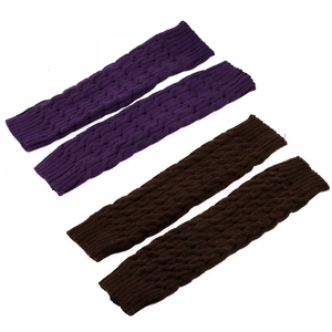 Detail of cable knit pattern on purple and brown chunky wool leg warmers for winter