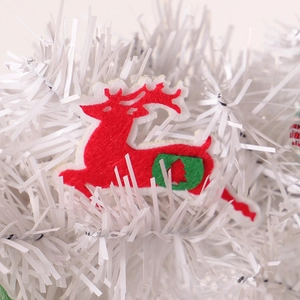 Christmas reindeer hanging ornament with red and green ribbons in festive holiday wreath décor