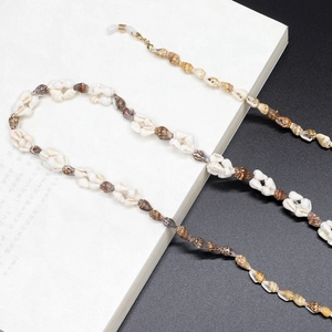 Handmade seashell eyewear chain with golden lobster clasps and non-slip silicone loops