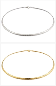 Detail of 4mm titanium steel flat omega chains in gold and silver with lobster clasp