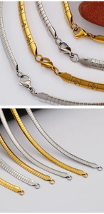 Detail of 6mm flat snake chain necklace with lobster clasp in gold and silver finishes