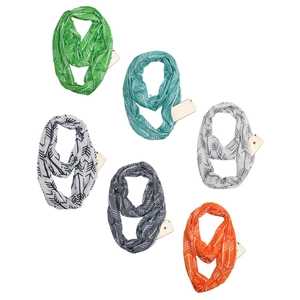 Detail of infinity scarves in various colors with zipper pockets for smartphones