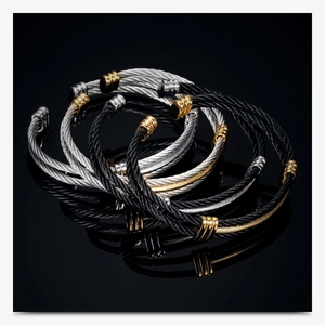 Detail view of 10mm braided stainless steel bracelets in black and silver metallic tones