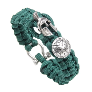 Green paracord survival bracelet featuring silver Spartan helmet and shield charms