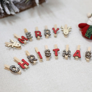 Christmas themed wooden clips with Merry Christmas text and reindeer for party decor