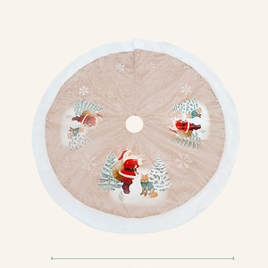 Round beige Christmas tree skirt with white plush trim featuring Santa and reindeer motifs