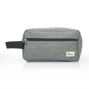Gray fabric travel toiletry bag with black zipper and side handle for men